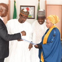 Prince Ned Nwoko briefing the Fct Minister Mohammed Bello on eradication of Malaria in Africa.