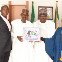 Prince Ned Nwoko briefing the Fct Minister Mohammed Bello on eradication of Malaria in Africa.
